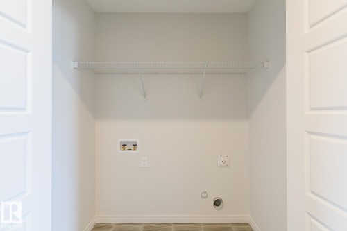 99 Silverstone Drive, Stony Plain, AB - Indoor With Storage