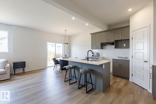 99 Silverstone Drive, Stony Plain, AB - Indoor Photo Showing Kitchen With Upgraded Kitchen