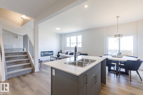 99 Silverstone Drive, Stony Plain, AB - Indoor Photo Showing Kitchen With Double Sink