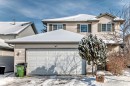 Two-story residence featuring light-toned siding and a two-car attached garage - 19024 50 Avenue, Edmonton, AB  - Outdoor 