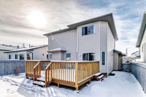 Private backyard featuring a spacious wood deck, light gray siding, and a fenced perimeter - 19024 50 Avenue, Edmonton, AB - Outdoor With Exterior