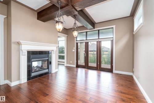 3312 Watson Bay Bay, Edmonton, AB - Indoor Photo Showing Living Room With Fireplace