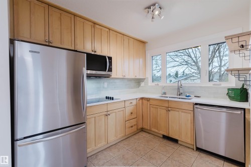 8311 160 Street, Edmonton, AB - Indoor Photo Showing Kitchen With Stainless Steel Kitchen With Double Sink
