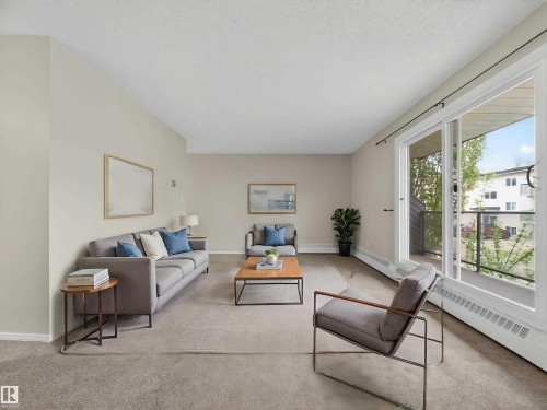 204 10731 84 Avenue, Edmonton, AB - Indoor Photo Showing Living Room