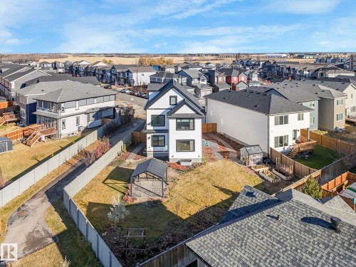 Contemporary two-story residence with white siding and black trim accents - 6613 62 Avenue, Beaumont, AB - Outdoor