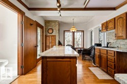 Central kitchen island with a light-toned countertop - 