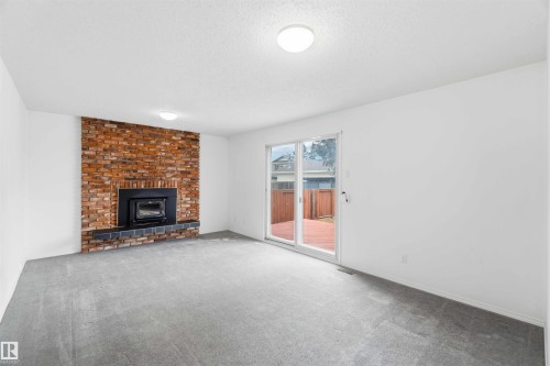 17919 94 Avenue, Edmonton, AB - Indoor Photo Showing Living Room With Fireplace