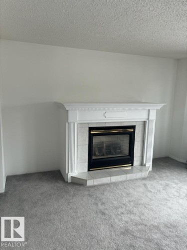 17919 94 Avenue, Edmonton, AB - Indoor Photo Showing Living Room With Fireplace