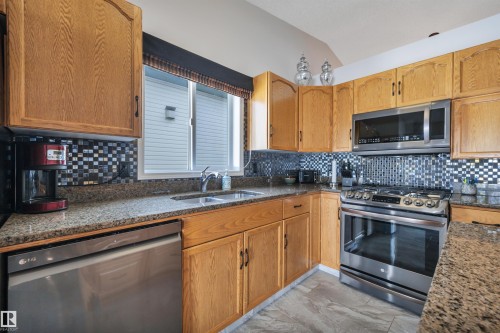 117 Hollick-Kenyon Way, Edmonton, AB - Indoor Photo Showing Kitchen With Double Sink