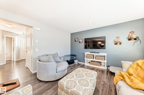 Open concept living area featuring wood-finish flooring - 267 Sturtz Bend, Leduc, AB - Indoor Photo Showing Living Room