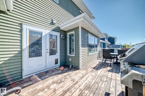 Expansive wooden deck with space for outdoor dining and entertaining - 267 Sturtz Bend, Leduc, AB - Outdoor With Deck Patio Veranda