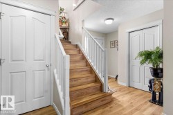 Staircase with wood-finish treads and white risers - 