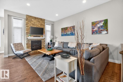 4232 8 Street, Edmonton, AB - Indoor Photo Showing Living Room With Fireplace