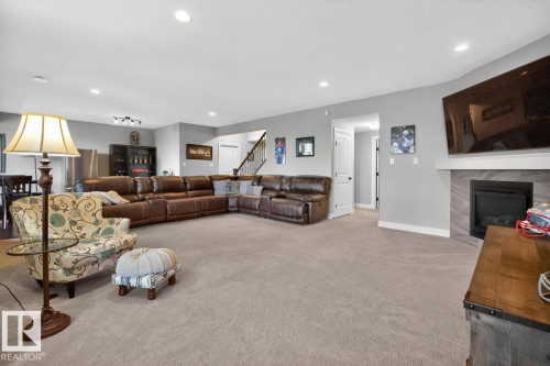 4232 8 Street, Edmonton, AB - Indoor Photo Showing Living Room With Fireplace