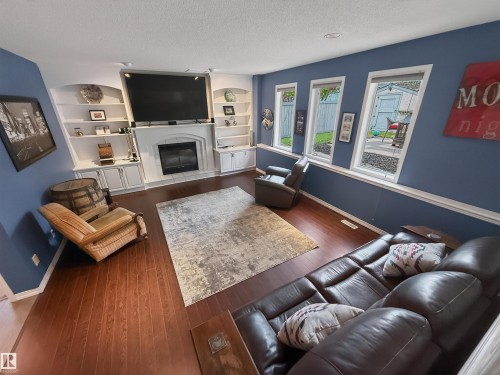 11 Lacombe Drive, St. Albert, AB - Indoor Photo Showing Living Room With Fireplace