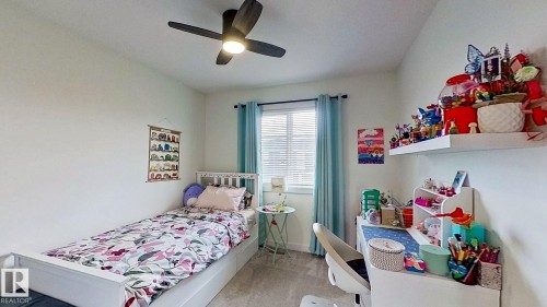 37 Emberside Link, Cochrane, AB - Indoor Photo Showing Bedroom