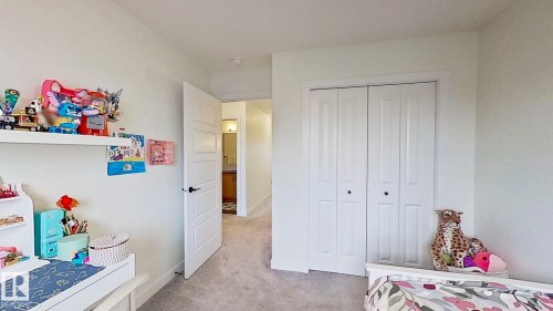 37 Emberside Link, Cochrane, AB - Indoor Photo Showing Bedroom