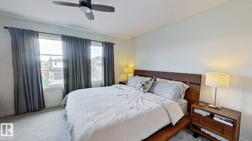37 Emberside Link, Cochrane, AB - Indoor Photo Showing Bedroom