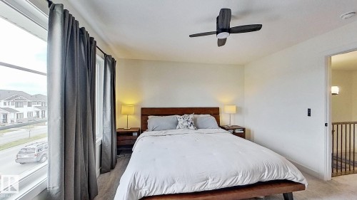 37 Emberside Link, Cochrane, AB - Indoor Photo Showing Bedroom