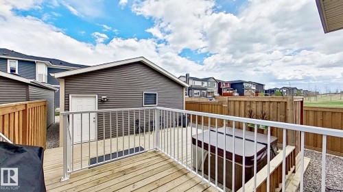 37 Emberside Link, Cochrane, AB - Outdoor With Deck Patio Veranda