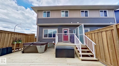 37 Emberside Link, Cochrane, AB - Outdoor With Deck Patio Veranda With Exterior
