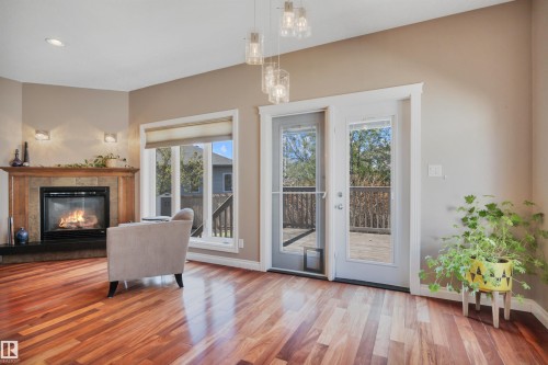 59 Wilkinson Place, Leduc, AB - Indoor Photo Showing Living Room With Fireplace