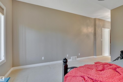 59 Wilkinson Place, Leduc, AB - Indoor Photo Showing Bedroom