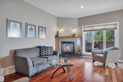 59 Wilkinson Place, Leduc, AB - Indoor Photo Showing Living Room With Fireplace