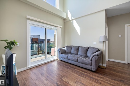 505 1238 Windermere Way, Edmonton, AB - Indoor Photo Showing Living Room