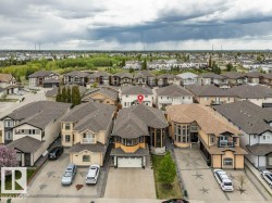 Aerial perspective showcasing a residential neighborhood with diverse housing styles - 