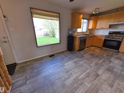 Dining area off the kitchen with easy access to the back yard. - 