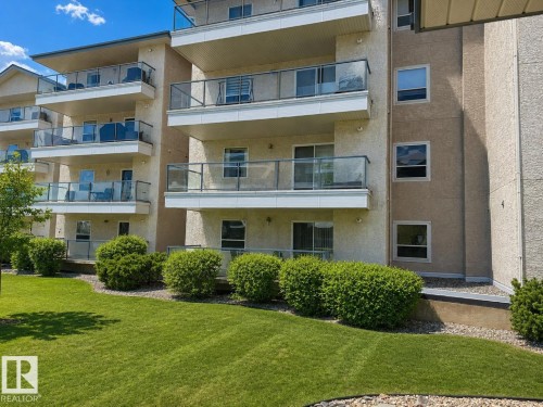 Multi-story building featuring private balconies with glass railings - 219 9535 176 Street, Edmonton, AB - Outdoor With Facade