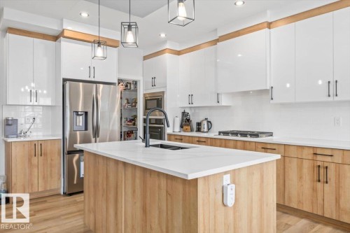 26 Ficus Way, Fort Saskatchewan, AB - Indoor Photo Showing Kitchen With Double Sink With Upgraded Kitchen