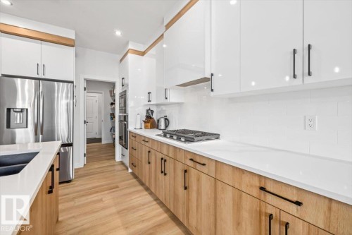 26 Ficus Way, Fort Saskatchewan, AB - Indoor Photo Showing Kitchen With Double Sink With Upgraded Kitchen