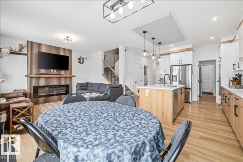 26 Ficus Way, Fort Saskatchewan, AB - Indoor Photo Showing Other Room With Fireplace