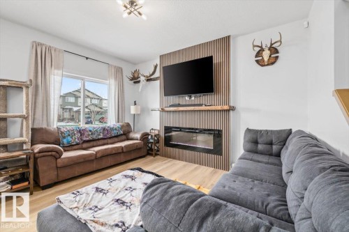 26 Ficus Way, Fort Saskatchewan, AB - Indoor Photo Showing Living Room With Fireplace