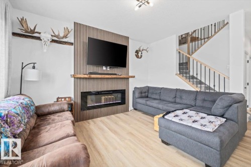 26 Ficus Way, Fort Saskatchewan, AB - Indoor Photo Showing Living Room With Fireplace
