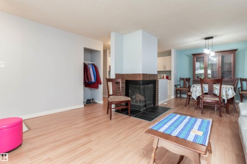 2109 Saddleback Road Nw, Edmonton, AB - Indoor Photo Showing Living Room With Fireplace