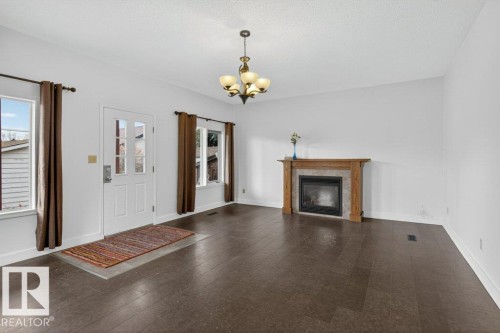 10640 79 Street Nw, Edmonton, AB - Indoor Photo Showing Living Room With Fireplace