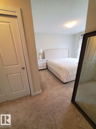 Image quality insufficient for description - 118 655 Watt Boulevard, Edmonton, AB - Indoor Photo Showing Bedroom