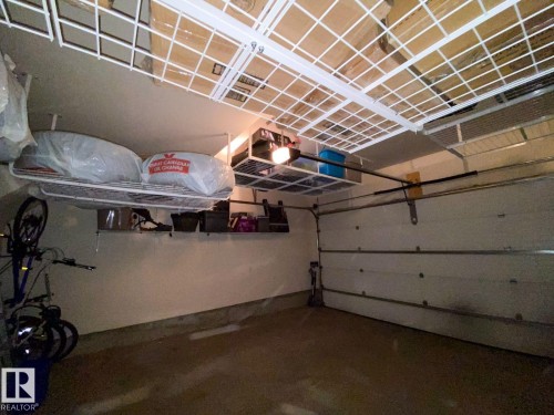 Image quality insufficient for description - 118 655 Watt Boulevard, Edmonton, AB - Indoor Photo Showing Garage