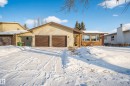 The property features a two-car garage with brown doors and a light-colored siding facade - 17 Austin Crescent, St. Albert, AB  - Outdoor 