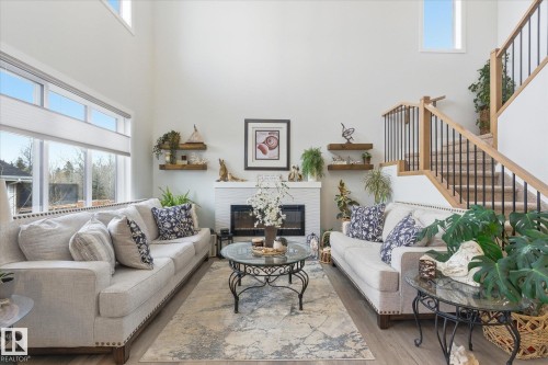75 Meadowpark Gate, Spruce Grove, AB - Indoor Photo Showing Living Room With Fireplace