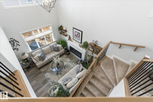 75 Meadowpark Gate, Spruce Grove, AB - Indoor Photo Showing Other Room With Fireplace