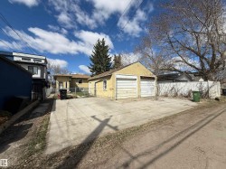 Detached two-car garage with two separate garage doors - 