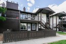 Multi-level residential building featuring brown siding and white stucco accents - 9221 172 Street, Edmonton, AB  - Outdoor 