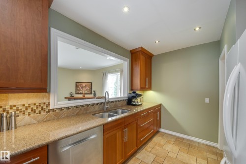 9327 75 Avenue, Edmonton, AB - Indoor Photo Showing Kitchen With Double Sink