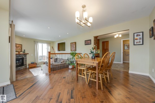 9327 75 Avenue, Edmonton, AB - Indoor Photo Showing Dining Room With Fireplace