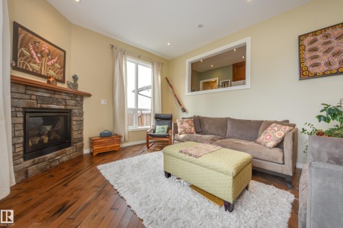 9327 75 Avenue, Edmonton, AB - Indoor Photo Showing Living Room With Fireplace