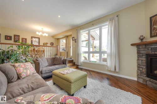 9327 75 Avenue, Edmonton, AB - Indoor Photo Showing Living Room With Fireplace